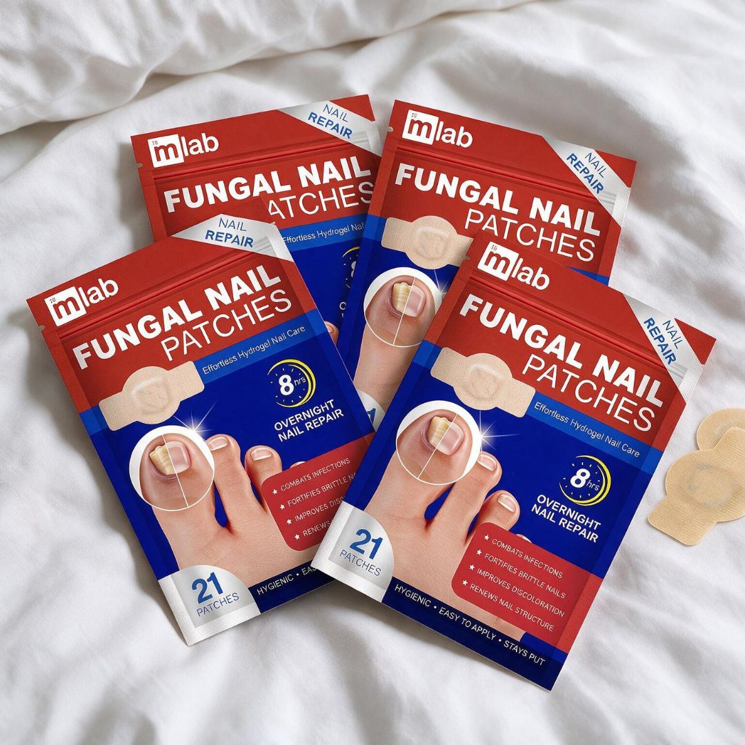 Four packages of mlab Fungal Nail Patches arranged on a white fabric background, with two loose beige nail patches placed to the right.