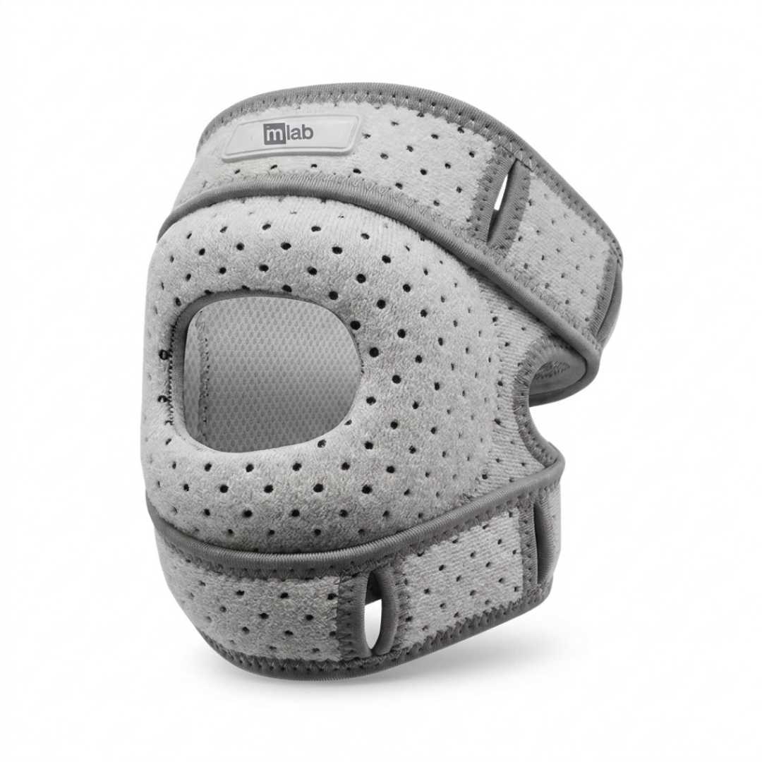 A light gray athletic knee support brace with a perforated mesh design and adjustable straps, shown on a white background.